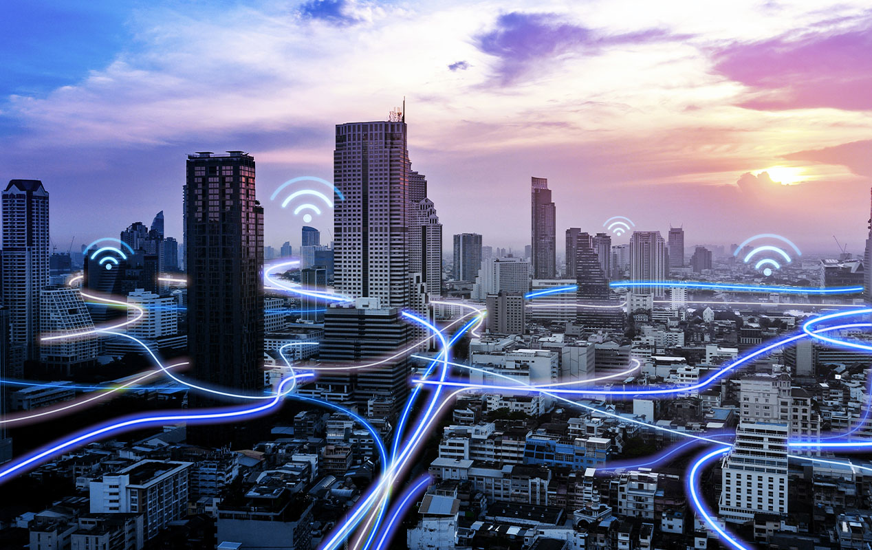 Cityscape showing IoT connections using Bell mobile networks.