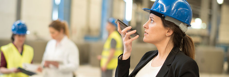 A field worker communicating using the Push to Talk solution from Bell.