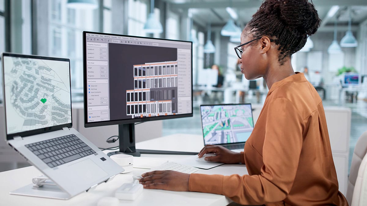 Building manager using LTE-M network connectivity to monitor smart building systems on screens.