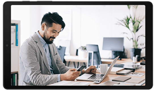 Employee accessing Bell Business Marketplace on his phone to manage his Microsoft 365 subscription and get quotes for new licences. 